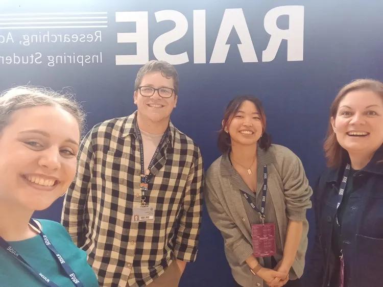 Photo of members of the co-creation team at a conference